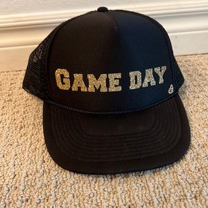 Black and gold mother trucker snapback hat